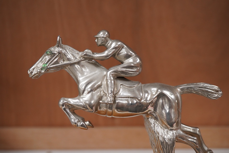 A chrome plated ‘jockey and horse’ car mascot, mounted, 18cm tall